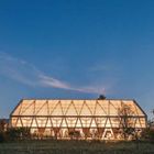 Oben steht: "127 Community Hall in Ancy-sur-Moselle". Darunter ein großes, modernes Gebäude mit Holzstruktur.