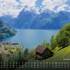 Kalender zeigt Mai über einem Bergsee. Im Vordergrund eine Hütte auf einer grünen Wiese, im Hintergrund schneebedeckte Berge.