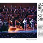 Text: "JOHN WILLIAMS: THE RETURN OF THE SYMPHONY." Darth Vader dirigiert ein Orchester, umgeben von Stormtroopern.