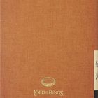 Lord of the Rings x Moleskine Logo auf einem orange-braunen Notizbuchcover mit gelbem Band.