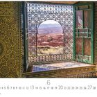 "Kasbah Telouet" und "CASARES EDITION" sind zu sehen. Offenes Fenster mit Eisengitter, Blick auf Wüstenlandschaft.