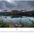 Unterhalb einer beeindruckenden Berglandschaft ist eine Kalenderansicht mit Zahlen 1 bis 30 und der Zahl 6 oben zu sehen.