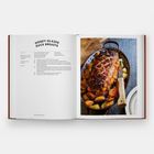 Text in Großbuchstaben: "Honey-Glazed Duck Breasts". Rezept beschrieben. Rechts ein Foto: gebratene Entenbrust mit Gemüse.