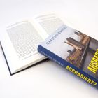 Titel: "Carsten Gansel: Ausradiert? Wie die Literatur der DDR verschwand". Ein aufgeschlagenes Buch liegt daneben.