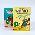 Zwei bunte Kinderbücher mit dem Titel "Ein Ritter namens Rost" und Figuren wie ein grüner Drache und ein Roboter.