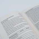 Text: "TEST: SO VIEL SENKT BEWEGUNG DEN BLUTDRUCK." Eine geöffnete Buchseite mit Tabellen und Erklärungen.