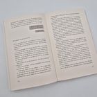 Seite eines Buches mit Text. Dialog: "6:45: wir treffen uns um 7 zum frühstücken" und "6:57: ma?". Seitenzahlen unten: 264, 265.