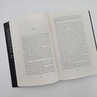 Offenes Buch, Seiten 78 und 79, enthält fortlaufenden Text aus einem erzählenden Werk. Kapitelüberschrift "12." auf Seite 78.