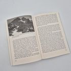 Zwei Buchseiten mit Text. Links oben ein Foto mit den Worten: "Ausblicke: das gewaltige Hüpfiesen mit Everest, Lhotse und Nuptse."