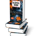 Das Cover zeigt "Klüpfel Kobr" oben, den Titel "Blendwerk" groß, darunter "Kluftinger ermittelt". Orange Blätter und ein Wasserfall.