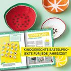 Kindgerechte Bastelprojekte für jede Jahreszeit. Offenes Buch mit Anleitungen, bunte bemalte Schalen wie Früchte.