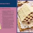 Titel: "EISBERGTORTE". Rezept für 12 Portionen, Zubereitungszeit: 70 Minuten. Bild: Torte mit Kirschen und Sahne.