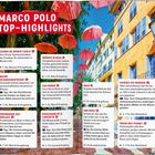 "MARCO POLO TOP-HIGHLIGHTS", roter Banner mit Texten über Sehenswürdigkeiten in Monaco, Nizza und Umgebung. Rote Schirme hängen über einer bunten Straße.