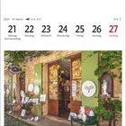 Juni-Kalender, Woche 25. Montag, 21. bis Sonntag, 27. Sommeranfang. Keramikgeschäft mit bemalten Tellern.