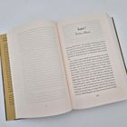 Kapitel 7: Patria o Muerte. Ein aufgeschlagenes Buch mit Fließtext auf weißem Hintergrund.