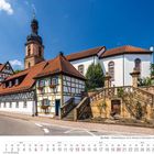 Die Pfalz - Fachwerkhäuser mit St. Michael in Rheinzabern. Ein malerisches Dorf mit Fachwerkhäusern und Kirche.