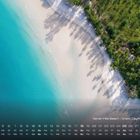 Kalenderansicht mit Sandstrand und klarem türkisfarbenem Wasser. Text: "Seven Mile Beach - Grand Cayman Karibik".