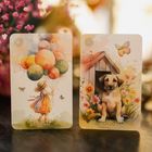 "CHILD" und "DOG" auf zwei Karten. Links ein Kind mit Luftballons, rechts ein Hund vor einer Hütte, umgeben von Blumen.