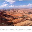 Text: "Panorama", "Casares Edition", "7", Datumsauswahl 1-31.  
Beschreibung: Wüstenlandschaft mit Hügeln und wenigen Häusern.