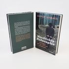 Buchtitel: "Verstrickte Philosophie", Autor: Oliver Jahraus. Ein Mann im Anzug geht mit einem Stock durch einen Wald.