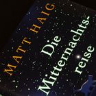 Text: "MATT HAIG Die Mitternachtsreise". Dunkler Hintergrund mit Sternen und einem Halbmond.
