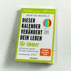 "Dieser Kalender verändert dein Leben für immer." Illustration eines Heißluftballons.