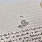 "24" über Muschelzeichnung, gefolgt von Text: "Das durfte doch nicht wahr sein! Endlich hatte Bernhardine..."