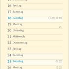 Monatskalender für Juli. Illustriert mit einem blauen Vogel und botanischen Elementen wie Blättern und gelben Blumen.