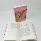 Buchcover: "LOUISA DELLERT: UNSHAME". Thema: Ideale und weiblicher Körper. Links stehendes Buch, rechts aufgeschlagen.