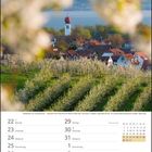 Obstblüte vor Kressbronn, markant die Pfarrkirche Maria Hilfe der Christen. Kalenderansicht für Ende März bis Anfang April 2027.