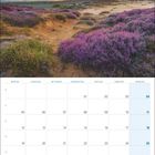 Kalenderblatt von Juli 2027. Oben eine Heide-Landschaft in lila Blüten vor einem Sonnenuntergang. Text: "SYLT...wie ich es liebe!"