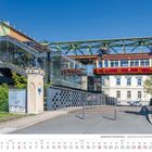 Adlerbrücke, Kaiserswagen Schwebebahn. Juli 2027 Kalender. Stahlkonstruktion, blauer Himmel, historische Schwebebahn.
