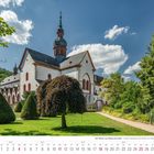 Der Rhein von Mainz bis Köln - Kloster Eberbach. Kalender für Juli 2027. Historisches Gebäude mit grüner Gartenlandschaft.