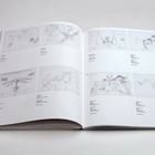 Texte: "Theme 8: Trouble. Transformation." Skizzen auf offenem Buch mit Bleistiftzeichnungen von Figuren und Objekten.