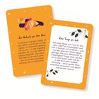 Zwei Karten, orange mit Text: "Ein Gedanke für dein Herz", "Eine Frage für dich", florale Verzierungen.