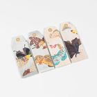 Keine lesbaren Texte. Vier Geschenkanhänger mit Illustrationen von bunten Schmetterlingen in verschiedenen Designs.