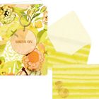 Text: "SHINE ON." Eine Karte mit floralen Mustern in Gelb und Orange, Umschlag mit gelben Streifen.