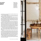 „REUSING A SPACE THAT ALREADY EXISTS, ADAPTING OURSELVES TO IT, THAT'S THE ESSENCE OF SUSTAINABILITY.“ Text links. Rechts rustikales Esszimmer.