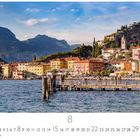 "Torbole", "8", "CASARES EDITION". Eine malerische Küstenstadt mit bunten Häusern, Bergen im Hintergrund und einem ruhigen See.