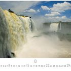 Text: "Iguazu Wasserfall", "CASARES EDITION", Zahlen von 1-31. Großartiger Wasserfall unter blauem Himmel mit weißen Wolken.