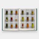 16 Gläser mit unterschiedlichen Inhalten, beschriftet mit Begriffen wie "Bay Leaf Oil", "BBQ Banana Peels", "Fermented Garlic Honey".