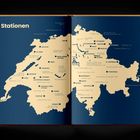 Texte: "Stationen". Karte mit beige Hintergrund, zeigt Schweizer Städte und Orte wie Basel, Zürich, Bern.