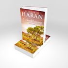 Ein Buchcover mit den Worten: "Elizabeth Haran, Outbackträume, Australien-Roman". Naturmotiv mit Baum in Wüstenlandschaft.