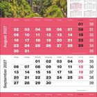 Kalender für August bis Oktober 2027. Oben ein gotisches Bauwerk in grüner Schlucht unter blauem Himmel.