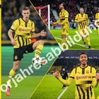 August 2026 Kalender, Born A4.mat", Spieler in gelben Fußballtrikots in Aktion, "Vorjahresabbildung" diagonal. Menge jubelt.