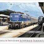 Text: Gleis 9, Schlossbräu Bräuhaus, Lok 1189.17 ÖBB, 8, 1971. Zwei Lokomotiven auf Gleisen. Kalender unter dem Bild.