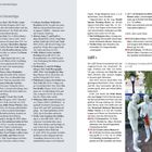 "Unsere Literaturtipps", "LGBT+", "Cafés, Bars und Clubs", Gelangweiltes Schild präsentiert Bücher. Skulpturen mit Regenbogenflagge.