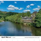 Kalender April/Mai 2027, 17. Woche, mit Landschaft: altes Fabrikgebäude am Fluss in grüner Umgebung, blauer Himmel.