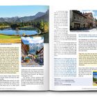 Tipp: Es ist immer wieder zu lesen, dass wir als Radler auch durch die Partnachklamm fahren können. Gemütliche Seenlandschaft und malerische Gebäude in einem Reisemagazin.