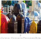Traditionelle Arabische Lampen. Zahl 9 in der Mitte unten. Bunte, reich verzierte Laternen in verschiedenen Farben.